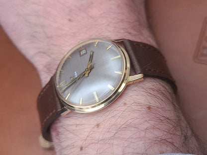 Montre oméga Genève or 18k