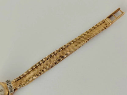 Montre de dame en or 18 carats massif