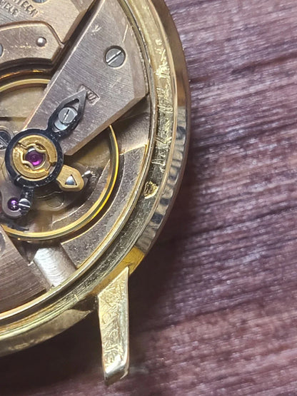 Montre oméga Genève or 18k